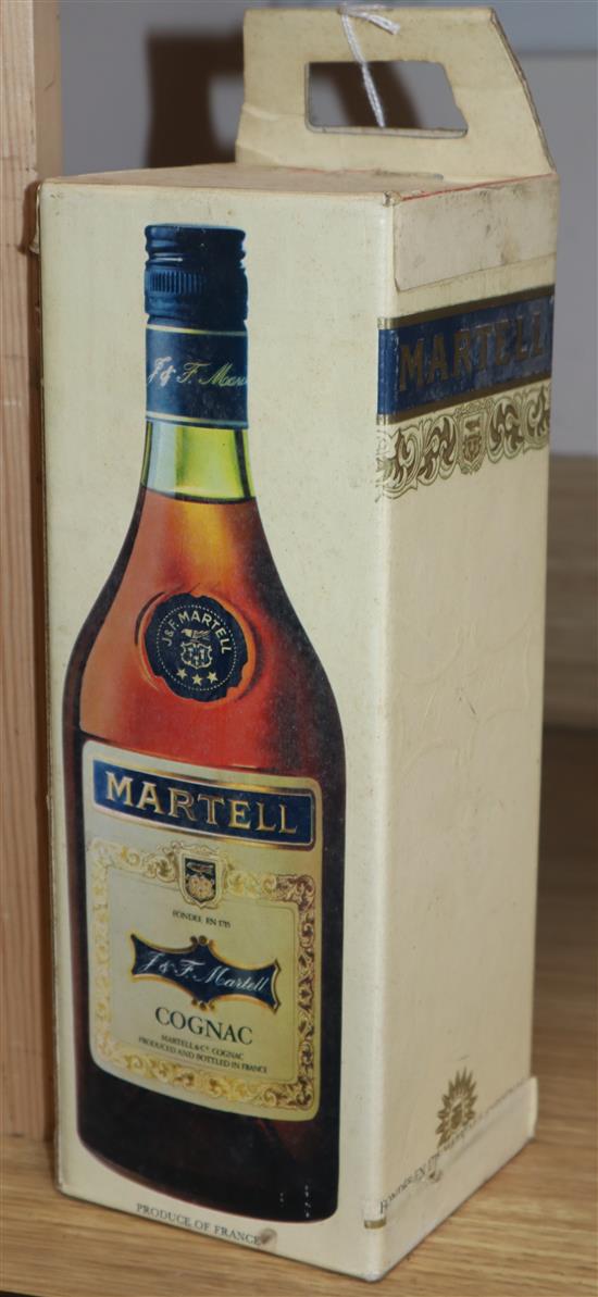 A bottle Martell 3 star cognac